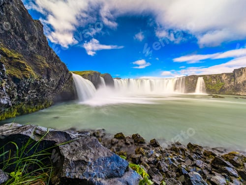 Preview: Godafoss waterfall with colorful sunset sky in summer at Iceland
