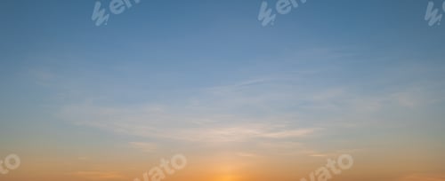 Preview: Morning sky scene with a bright golden light. Beautiful sunrise with clouds soft.