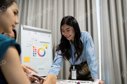 Preview: Professional Team Collaborating in Modern Office Environment with Creative Business Strategies and