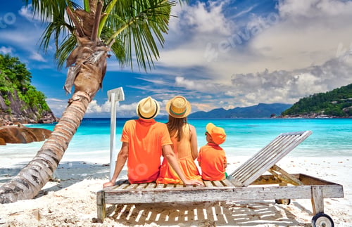 Preview: Family On Beautiful Petite Anse Beach, Young Couple With Three Year Old Toddler Boy Sitting On Sun