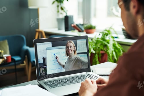 Preview: Laptop screen with mature blond confident teacher
