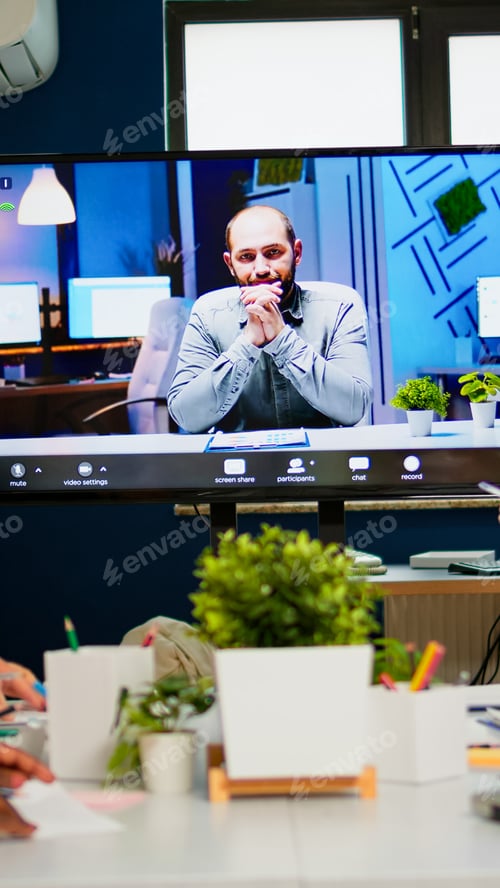 Preview: Manager man talking with colleague using video call for virtual meeting
