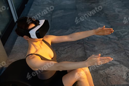 Preview: Beautiful girl doing yoga in the digital universe. Fitness of the future.
