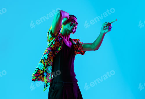 Preview: African man portrait in studio on colorful background