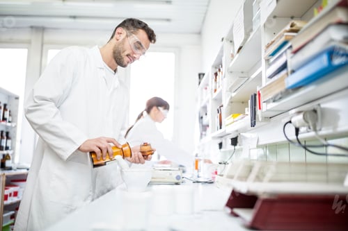 Preview: Man and woman working in laboratory of a pharmacy