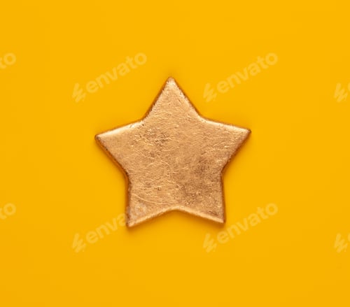 Preview: Christmas star decor on yellow colored background.