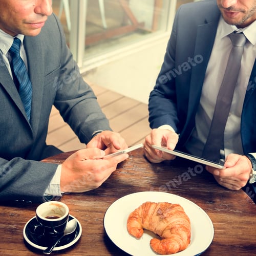 Preview: Two Businessmen Cafe Meeting Wireless Tablet Concept