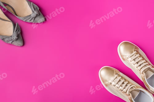Preview: Pair of female shoes and sneakers on pink background