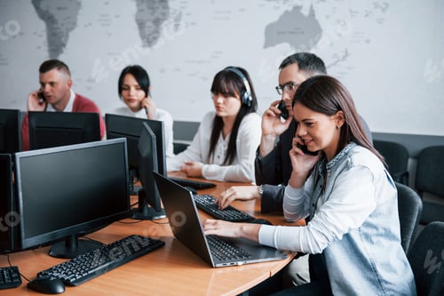 Preview: Everyone doing his job. Young people working in the call center. New deals is coming