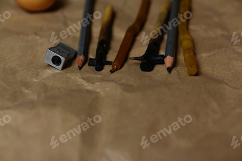 Preview: Rustic Pencils and Sharpener on Textured Brown Paper