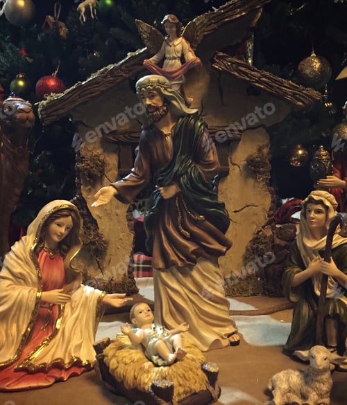 Preview: The holy family witness the birth of Jesus the Christ in this nativity set under the Christmas tree
