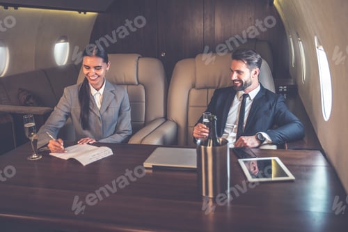 Preview: Business team on the private jet