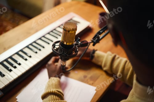 Preview: Man Recording Music In Studio