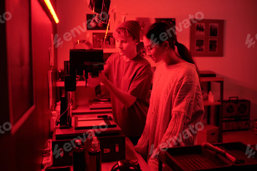 Preview: Teen Girl Boy Working On Photo Development