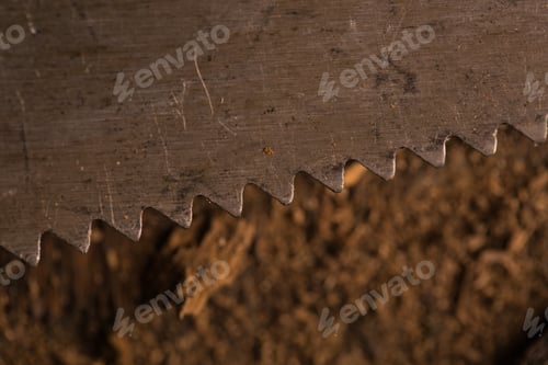 Preview: Close up view of a rusty handsaw