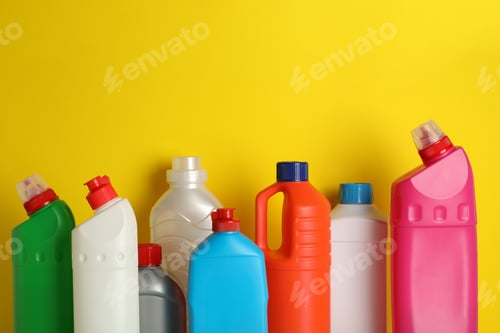 Preview: Blank bottles with different detergent on yellow background