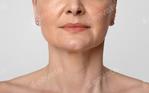 Preview: Anti-Aging Skincare. Cropped portrait of middle-aged woman with beautiful skin