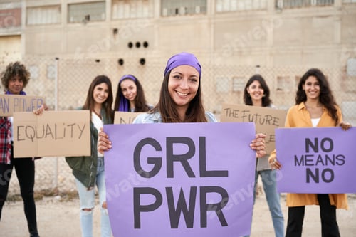 Preview: Group Holds Protest Signs for Women's Rights