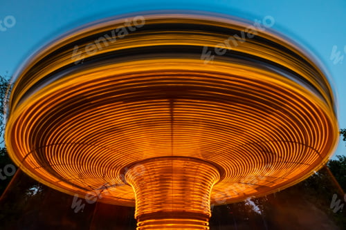 Preview: Long exposure of rotating merry go carousel