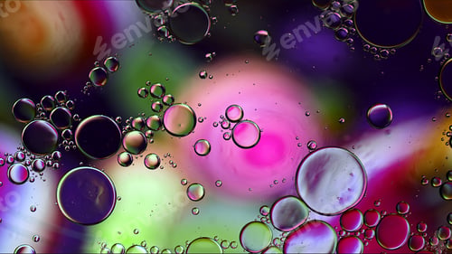 Preview: Abstract Colorful Food Oil Drops Bubbles and spheres Flowing on Water Surface