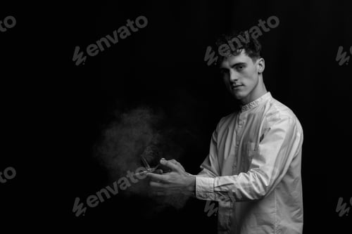 Preview: Handsome men. Barber is holding a brush for powder hairdresser and scissor