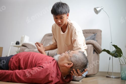 Preview: Fainted Grandfather Falling Down Lying On Floor And Young Man Helping