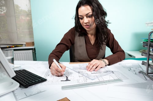 Preview: Close up of architect woman at her working desk
