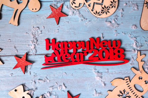 Preview: wooden hanging toys and Merry Christmas greeting small red letters