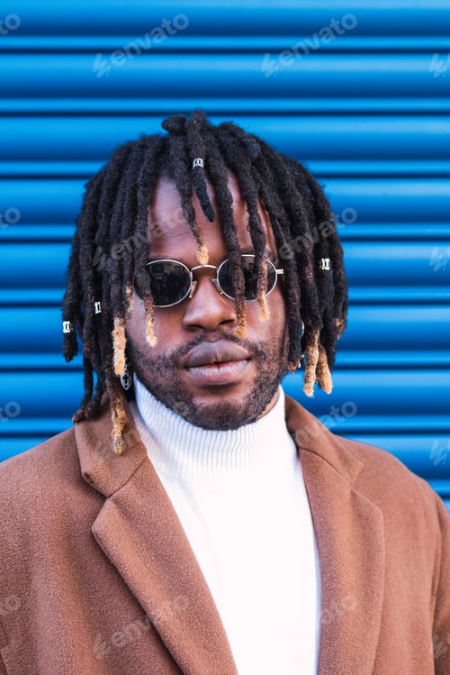 Preview: Black man in trendy sunglasses in city