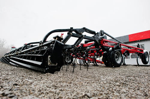 Preview: New red agricultural seeder close up view