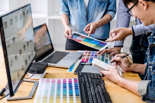 Preview: Young creative team having a meeting in creative office