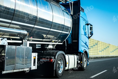 Preview: Long vehicle truck with tank trailer on a highway.