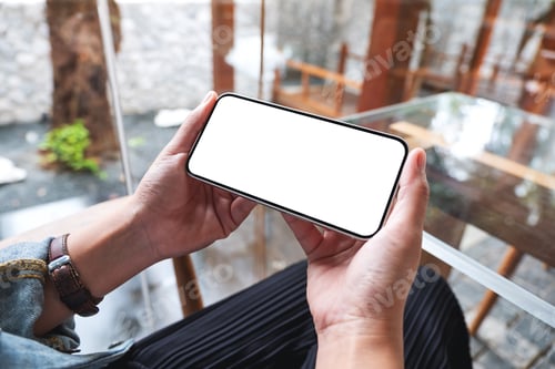 Preview: Mockup image of hands holding mobile phone with blank desktop screen