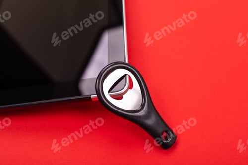 Preview: Tablet close-up as part of cooking equipment in kitchen isolated on red background
