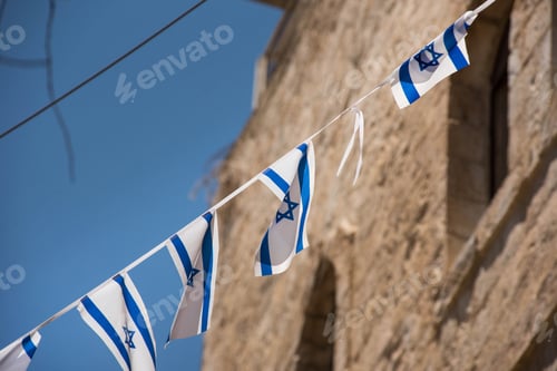 Preview: The flag of Israel blowing in the wind. Star of David