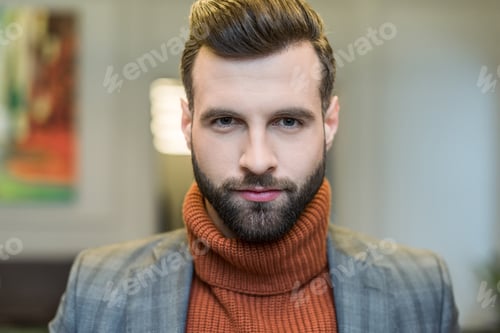 Preview: portrait of bearded handsome man in formal wear looking at camera