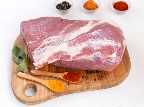 Preview: Raw Meat and Spices on a Wood Board