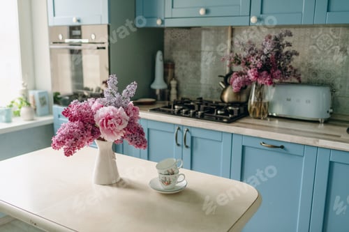 Preview: Bouquet of flowers on the table in the kitchen, kitchen design, blue color