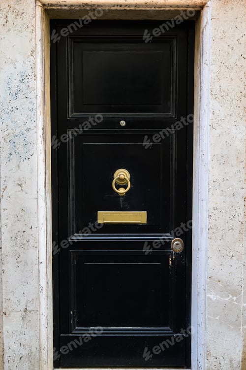 Preview: Rome, Italy. Ancient entrance black door.