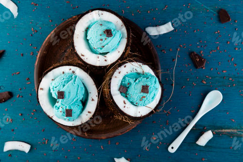 Preview: Blue ice cream in coconut bowl.