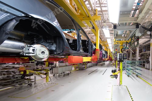 Preview: transfer of car body bottom view. Robotic equipment makes the Assembly of car. Modern car Assembly