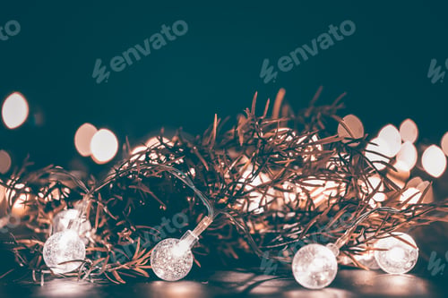 Preview: Christmas decorations with fir branch in magic holiday light.
