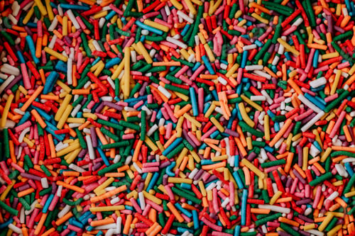 Preview: Sugar sprinkle dots background. Colorful decoration for cake