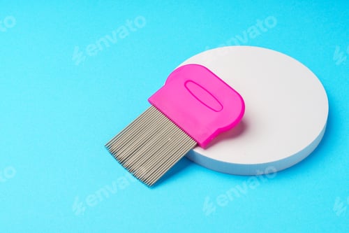 Preview: Comb for lice removing on blue background