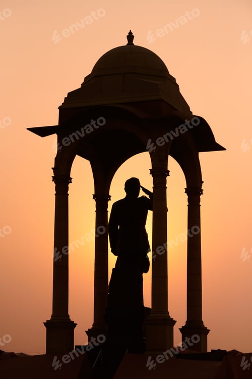 Preview: Silhouette of Subhas Chandra Bose statue under canopy behind India Gate war memorial