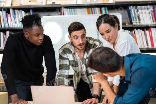 Preview: Young diverse creative designer team discussing and brainstorming work togethe