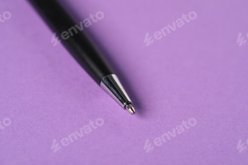 Preview: One stylish pen on violet background, macro view. Space for text