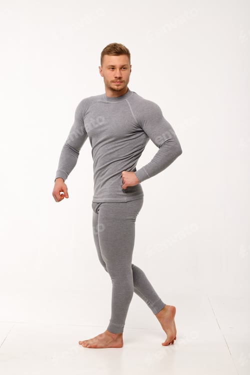 Preview: A man with a sporty physique in thermal underwear.