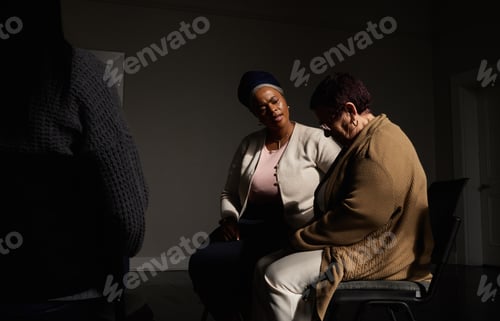 Preview: Support, therapist and black woman in group therapy, understanding and sharing, talking at session.