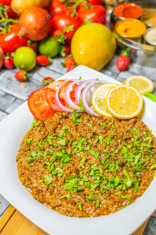 Preview: Seekh kabab Fry served in plate with Salad & Nan